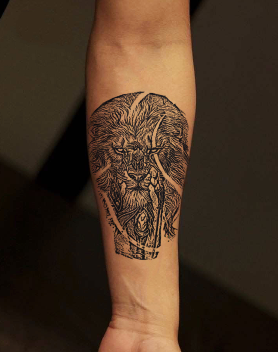 Detailed lion tattoo design on a forearm showcasing bold lines and intricate details, representing strength and creativity.